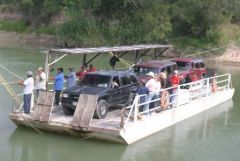 The hand pulled ferry on the Rio Grande River at Los Ebanos,