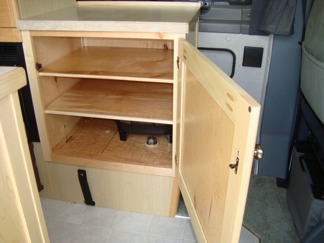 Driver’s side cabinet, open